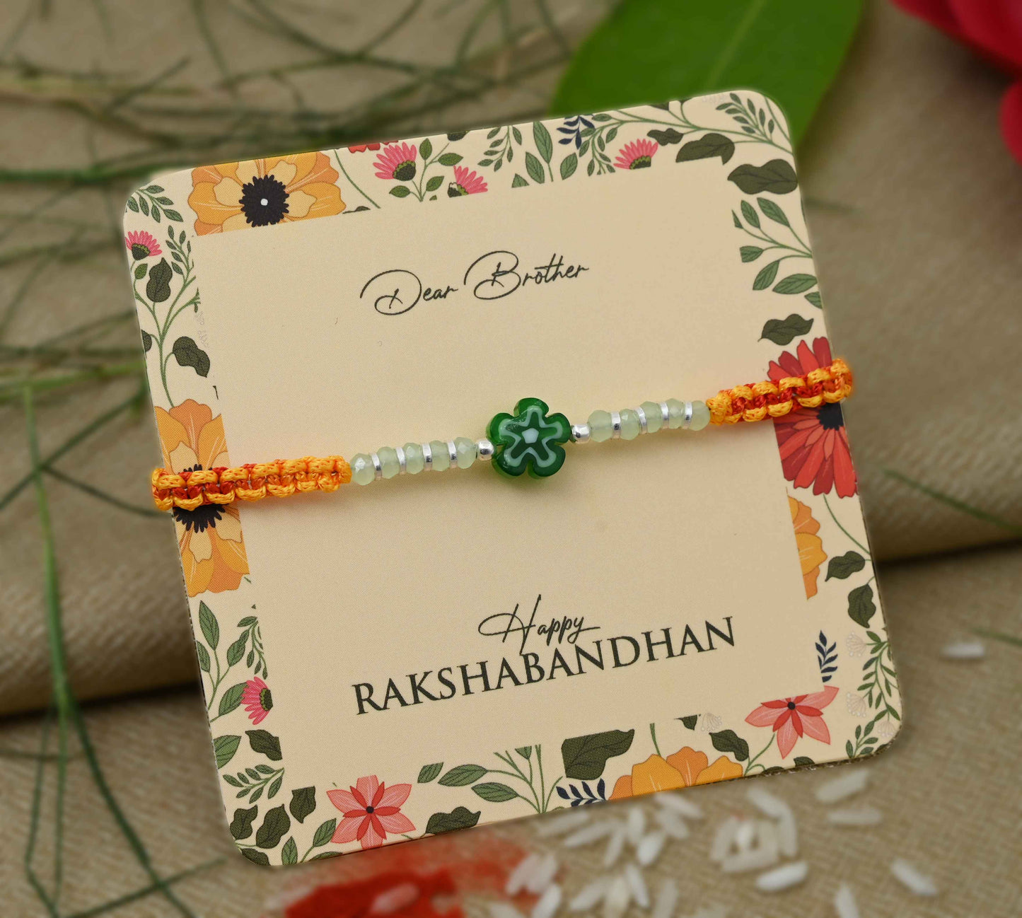 Silver Center Green Flower with Silver and Light Green Beads Rakhi for Boys
