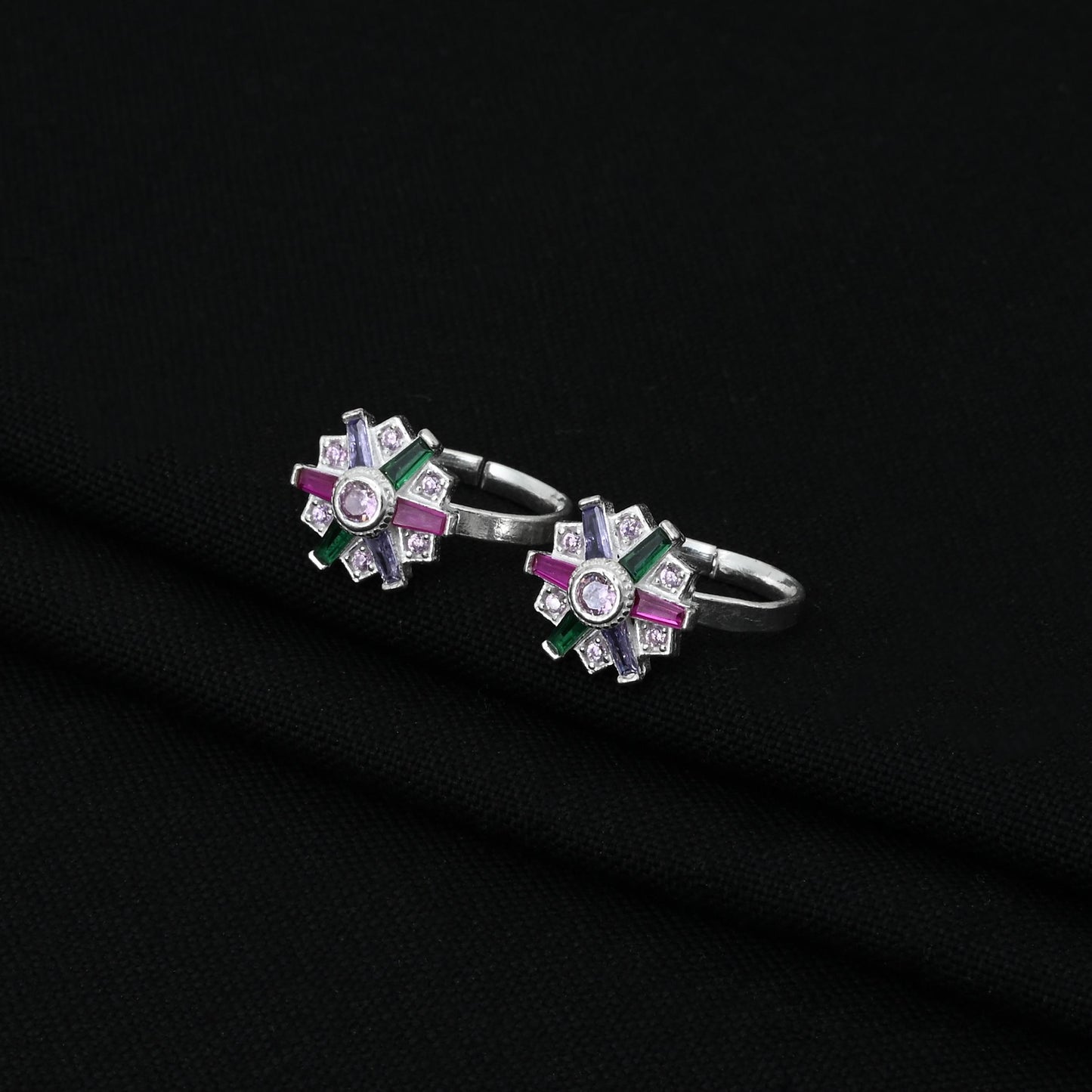 Handcrafted silver toe rings with a striking hexagonal shape and vibrant multi-gem accents