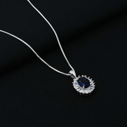 Sterling silver pendant featuring an oval-shaped blue stone, perfect for girls