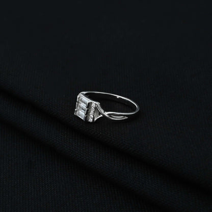 Stylish silver ring adorned with three rectangle stones.