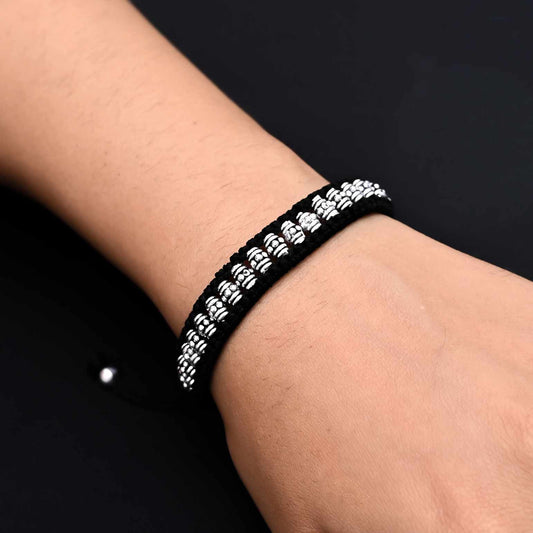 Men's silver bracelet featuring oval-shaped silver beads for a sleek design