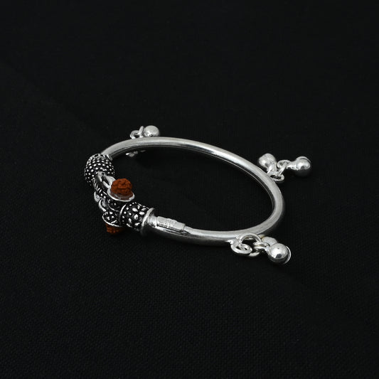 Charming silver baby's kada adorned with Rudraksha beads for a traditional touch