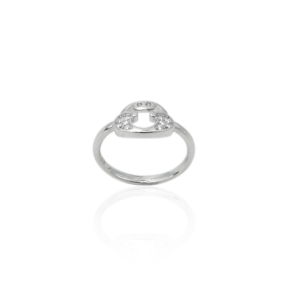 Elegant silver baby's ring with a solitaire gemstone, offering a delicate and timeless touch.