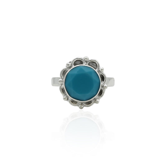 Silver ring featuring a dreamy oceanic blue stone, offering a serene and calming look.