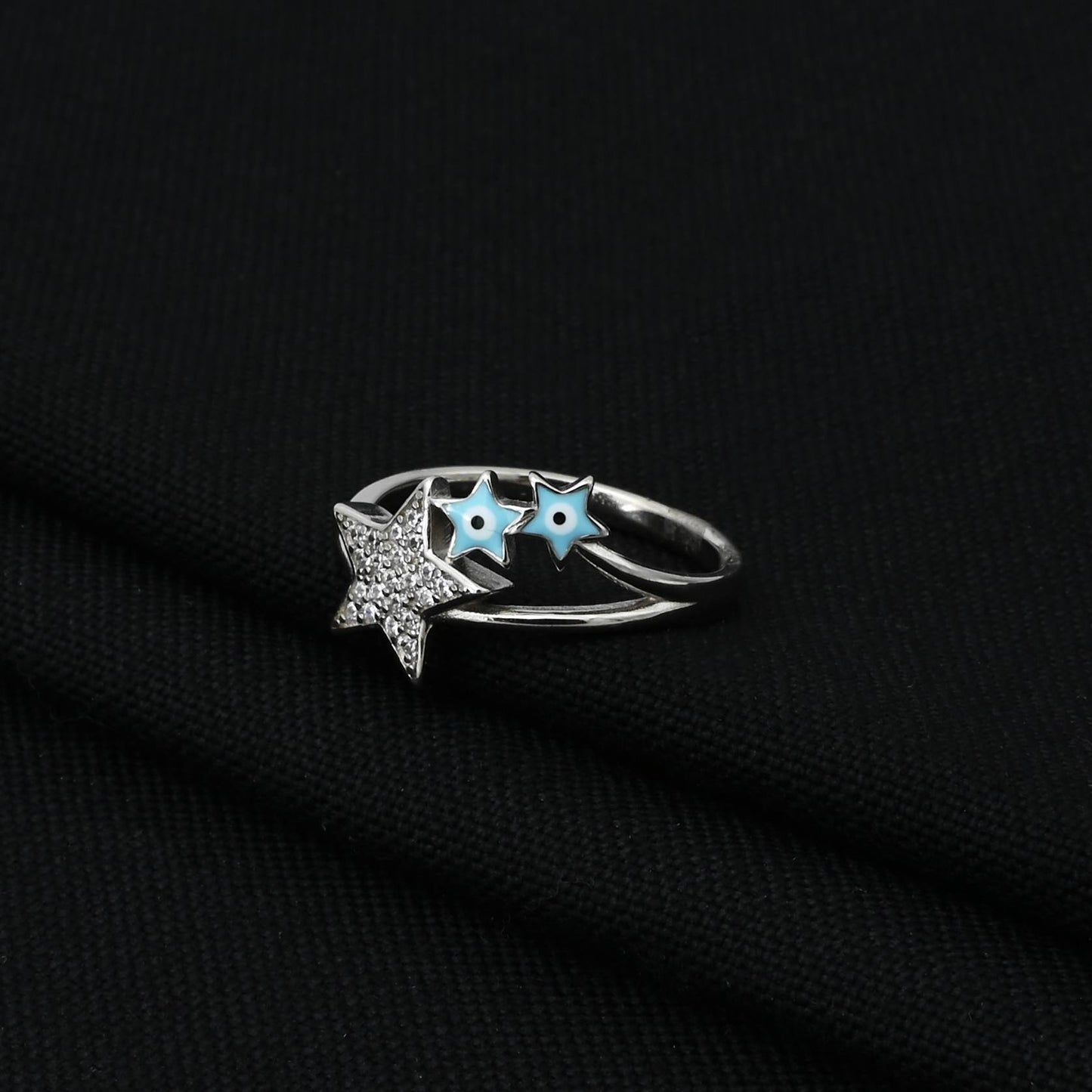 Elegant silver ring for girls showcasing a delicate design with stars, expressing love and beauty.