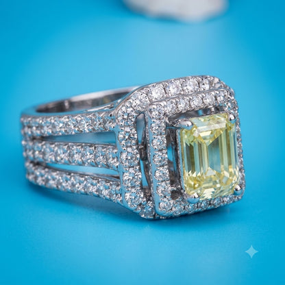 Silver Hand-Engraved Ring with Intricate Design and Yellow Stone.