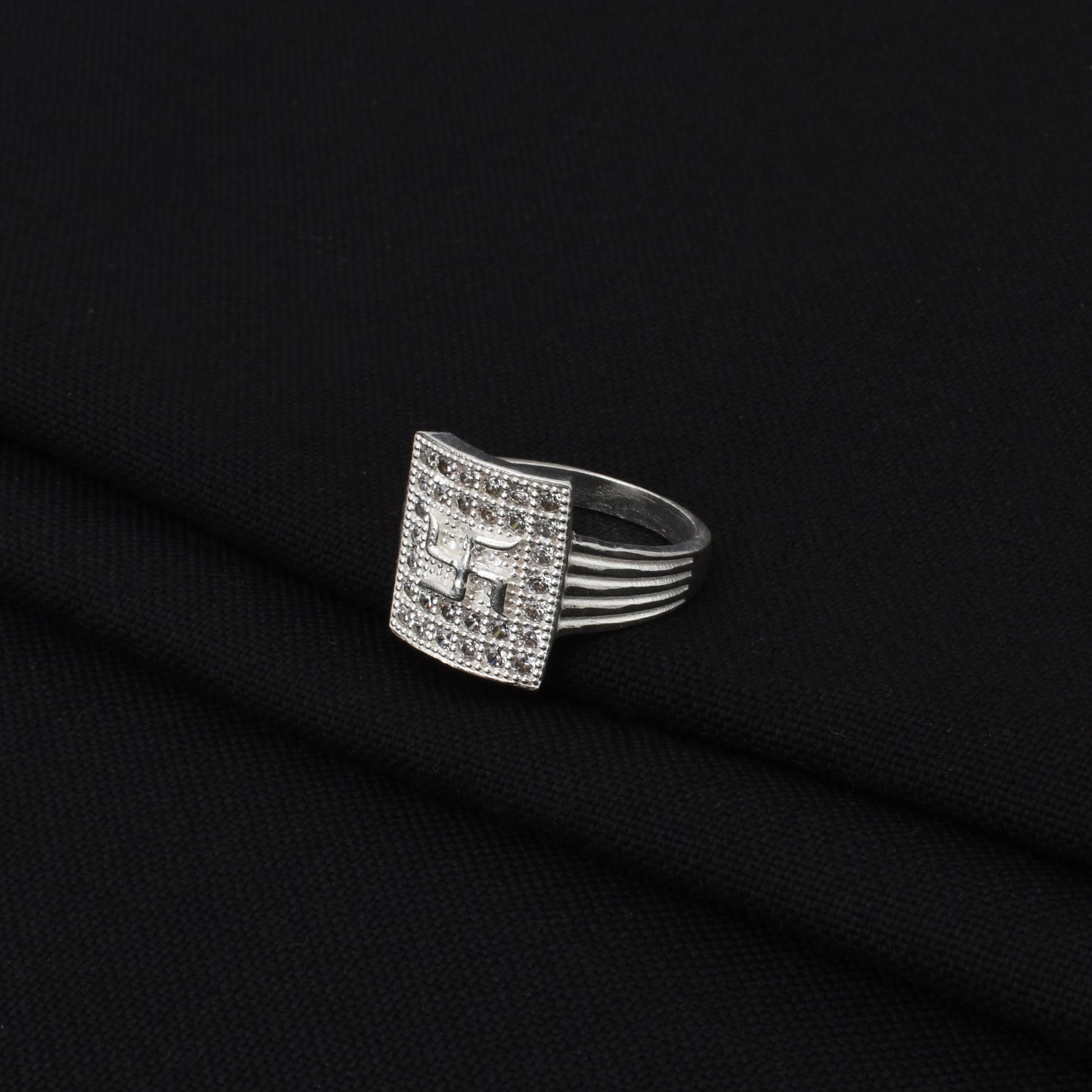 Stylish silver boys' ring showcasing the 'Swastika' symbol, a timeless emblem of well-being and prosperity.