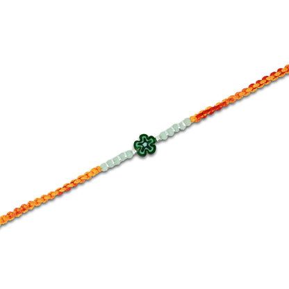 Silver Center Green Flower with Silver and Light Green Beads Rakhi for Boys