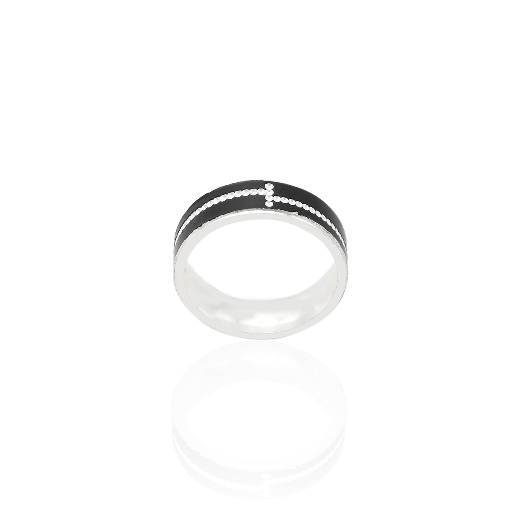 Close-up of a silver boys' ring with a simple, clean design for a modern look