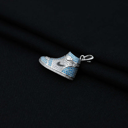 Charming sterling silver pendant with a detailed blue Jordan shoe motif