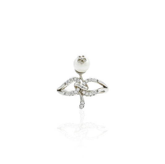 Silver ring featuring a delicate flower design with a pearl center.