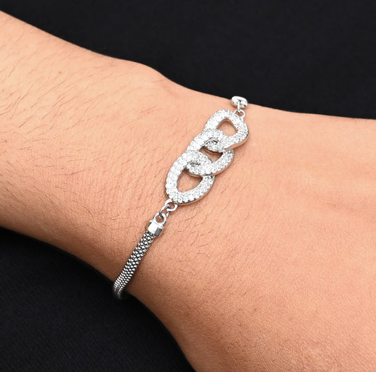 Elegant silver bracelet featuring a gorgeous trio of linked design