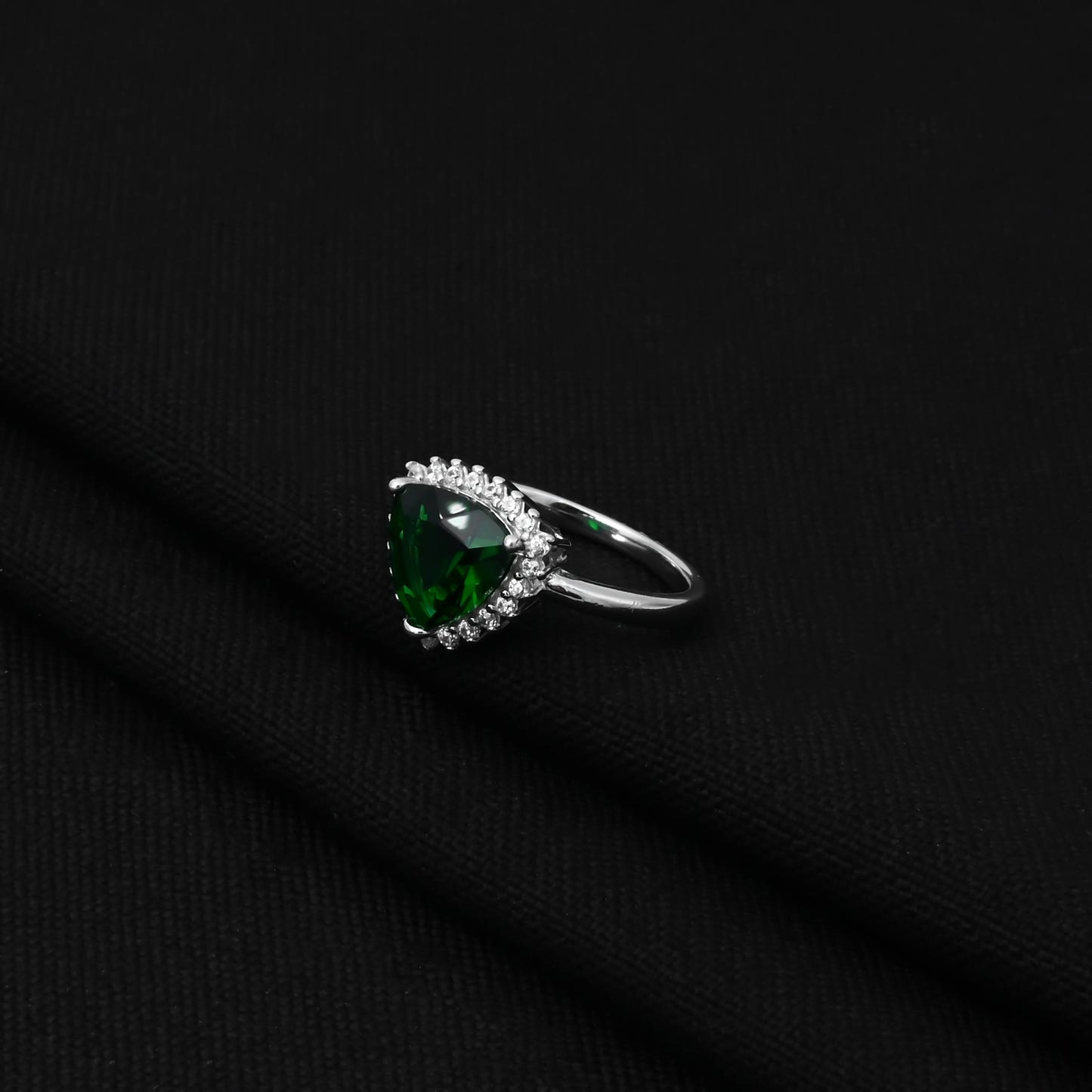 Stylish sterling silver ring with a striking triangular green emerald for a sophisticated look