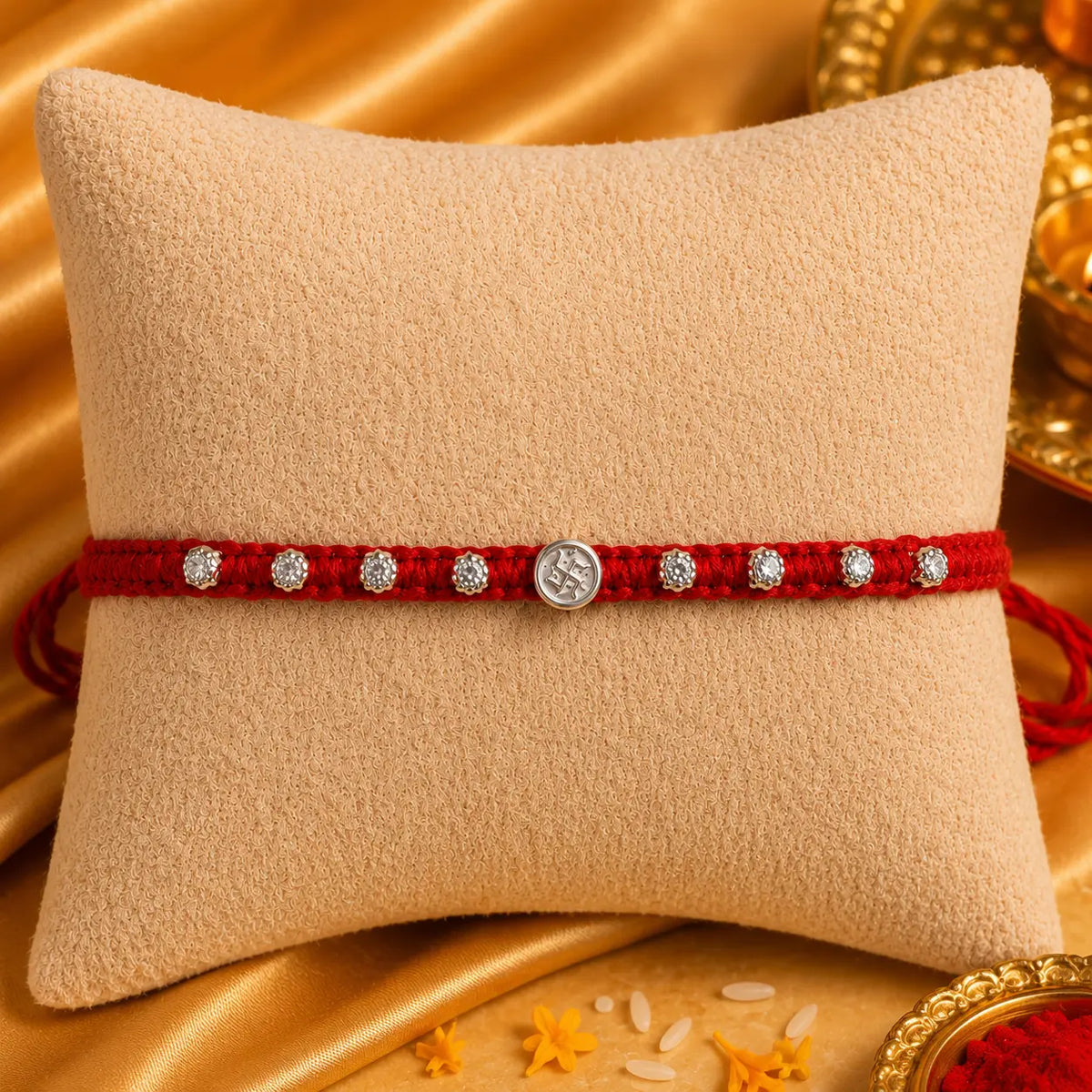 Silver Swastik Rakhi with Red Thread