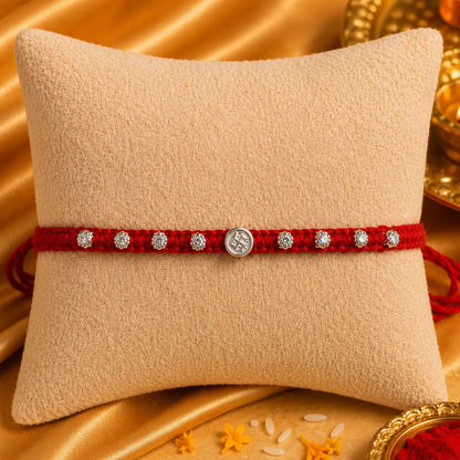 Silver Swastik Rakhi with Red Thread