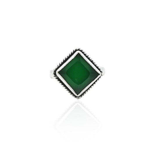 Silver ring featuring a striking dark green stone, offering a bold and elegant touch to any outfit.