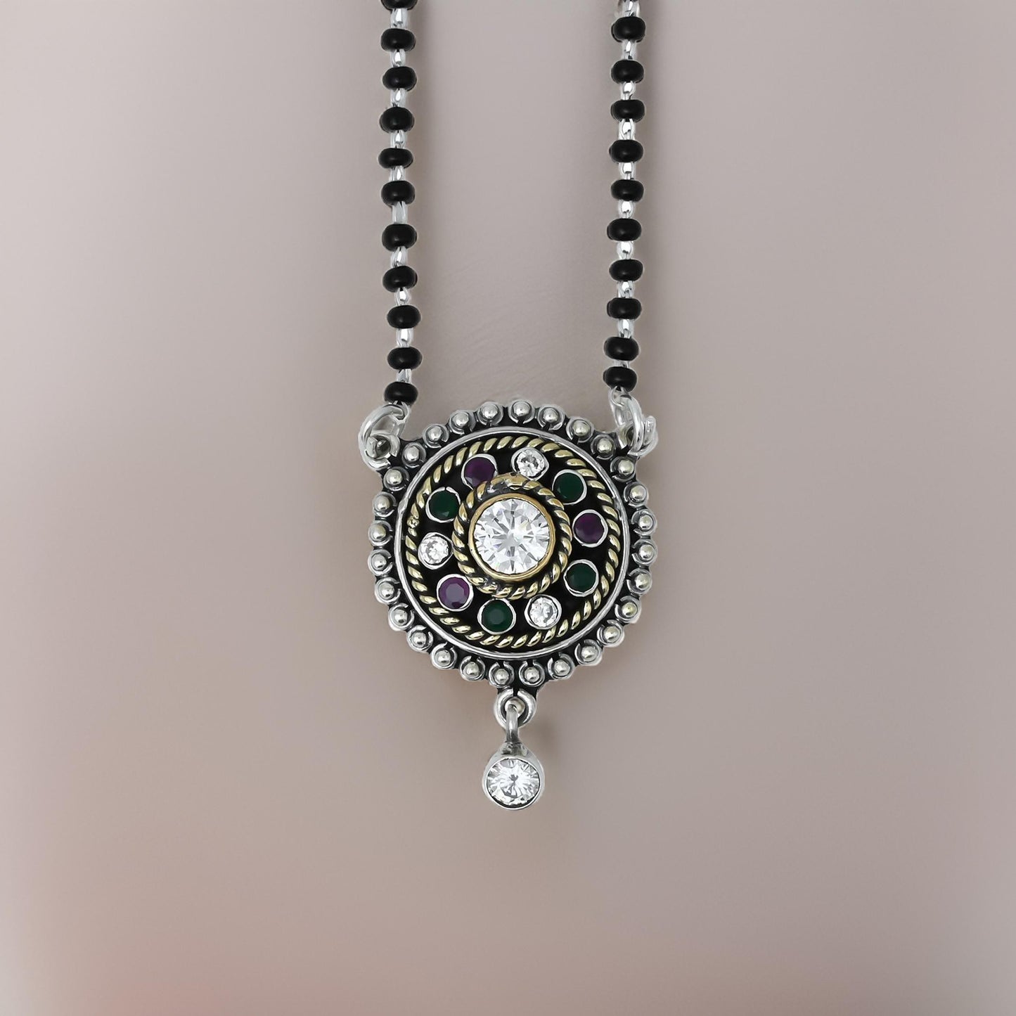 Elegant sterling silver mangalsutra with round stones and an intricate flower pattern