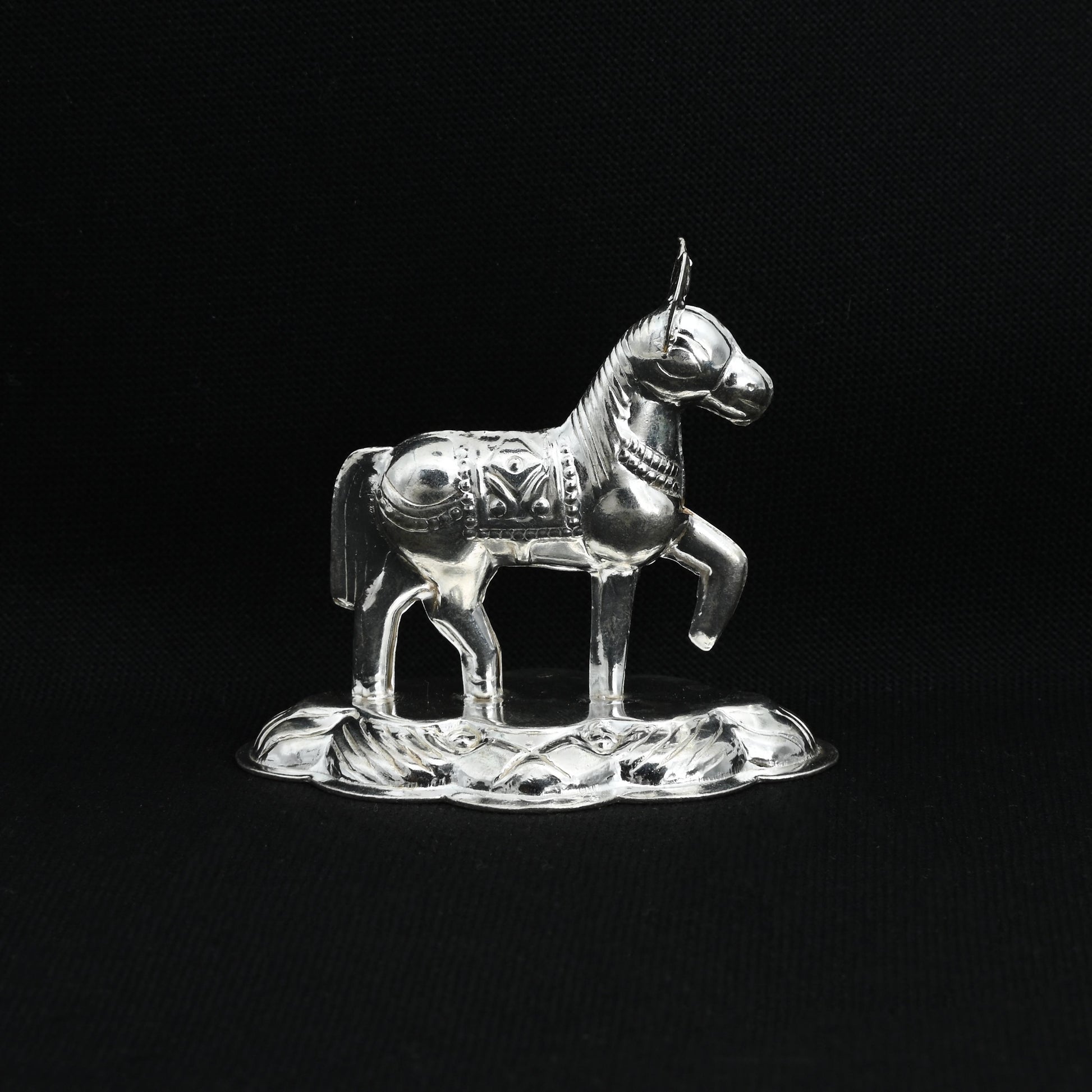 Elegant silver classical horse, adding a sophisticated touch to any collection or decor