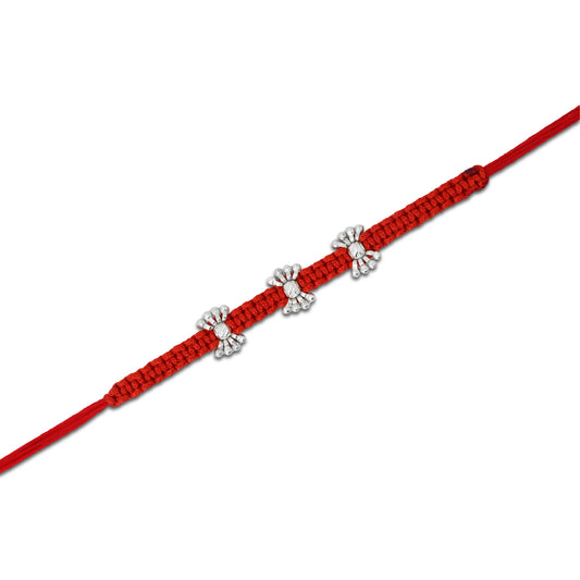 Boys' Rakhi with delicate small silver beads for a sleek look.