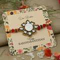 Silver center Om flower design with multi-color beads, perfect Rakhi for boys
