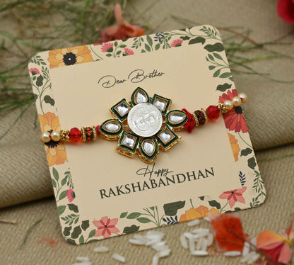 Silver center Om flower design with multi-color beads, perfect Rakhi for boys