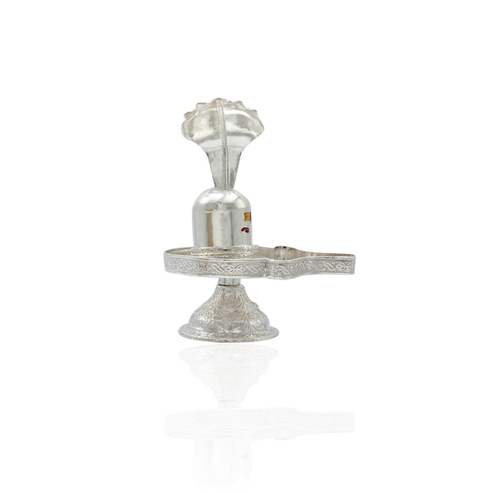 Exquisite silver Shivling in a Sheshnag statue, symbolizing divine power