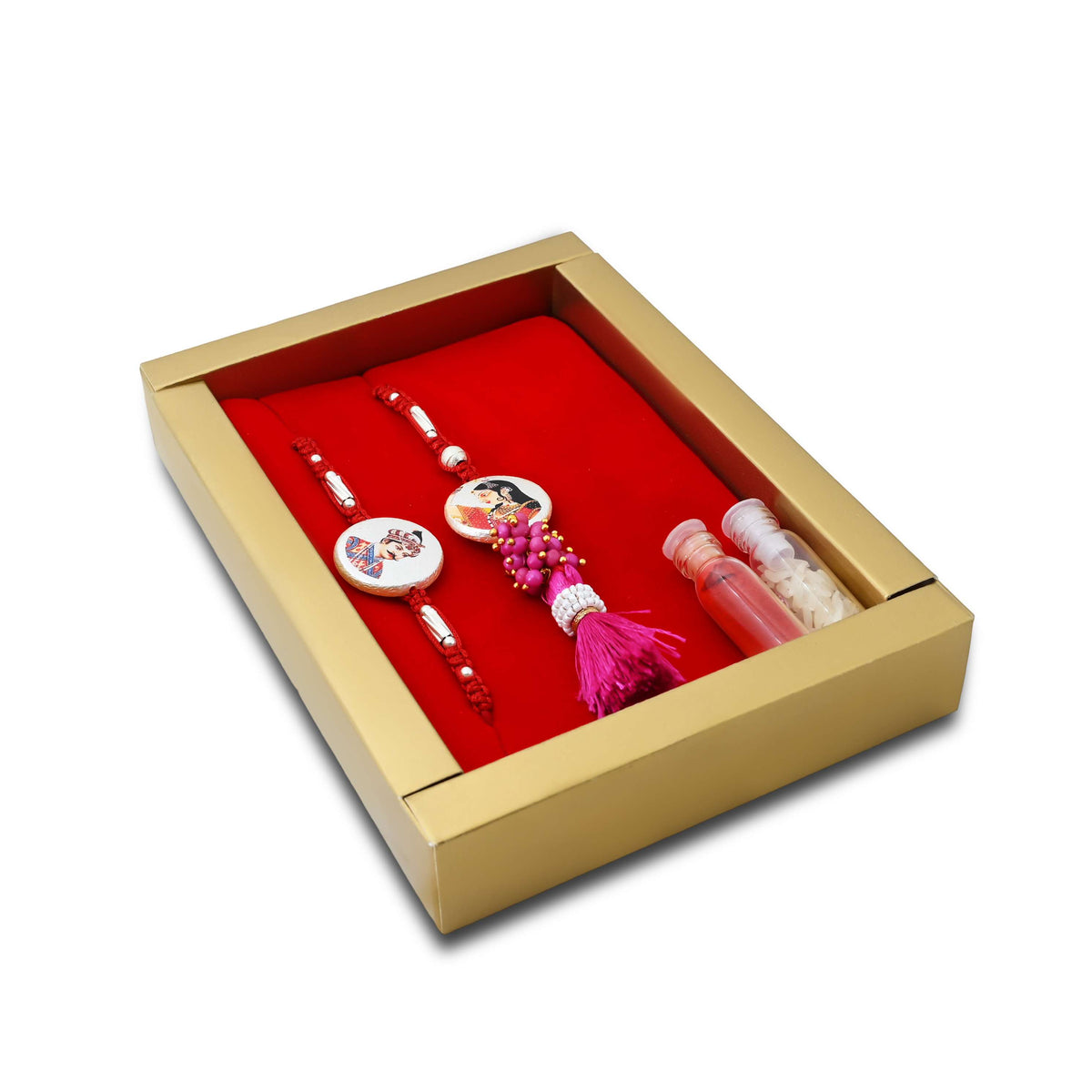 Silver Raja Rani Rakhi with a pink theme, kumkum, and rice, perfect for boys