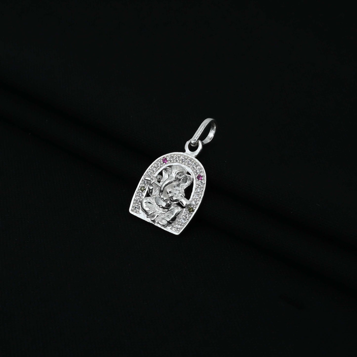 Charming silver pendant showcasing Ganesh Ji with a green gemstone and ping detail