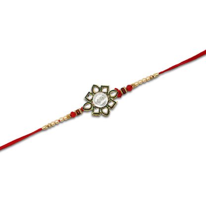 Boys' Rakhi featuring a silver Om flower centerpiece with vibrant multi-color beads.