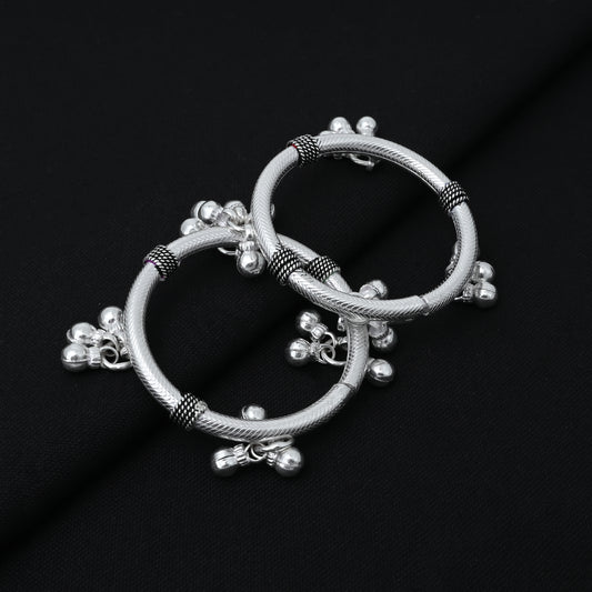 Charming silver baby kada adorned with a unique triple looped design