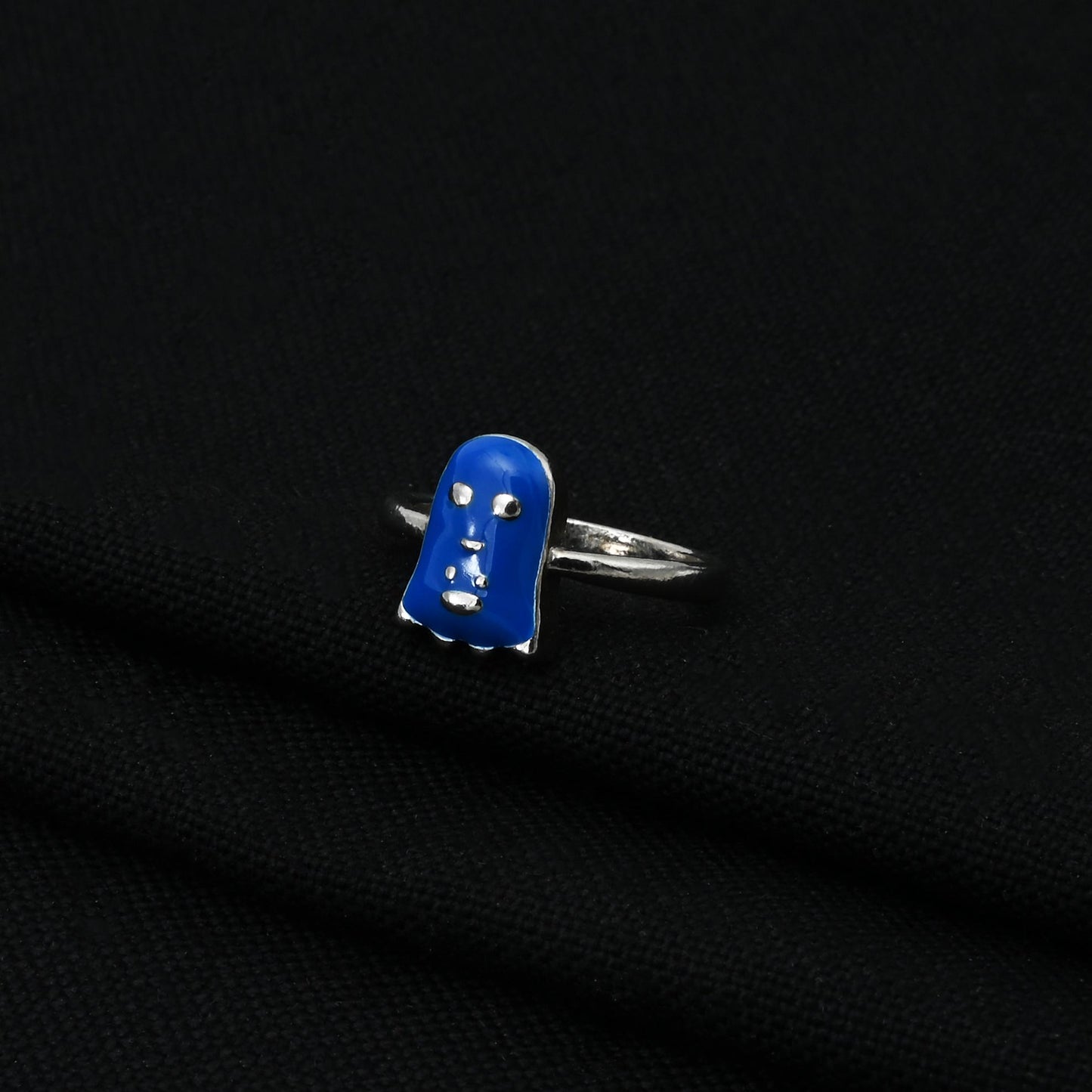 Stylish silver baby ring with a blue teddy bear, designed to be a delightful and fun accessory for young ones.