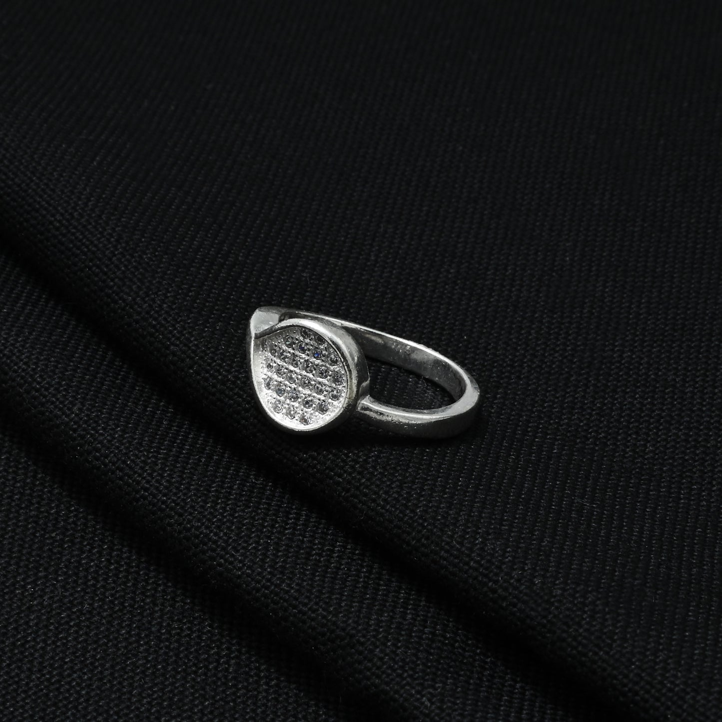 Silver Vanki ring featuring a sparkling curved design for a graceful and elegant look