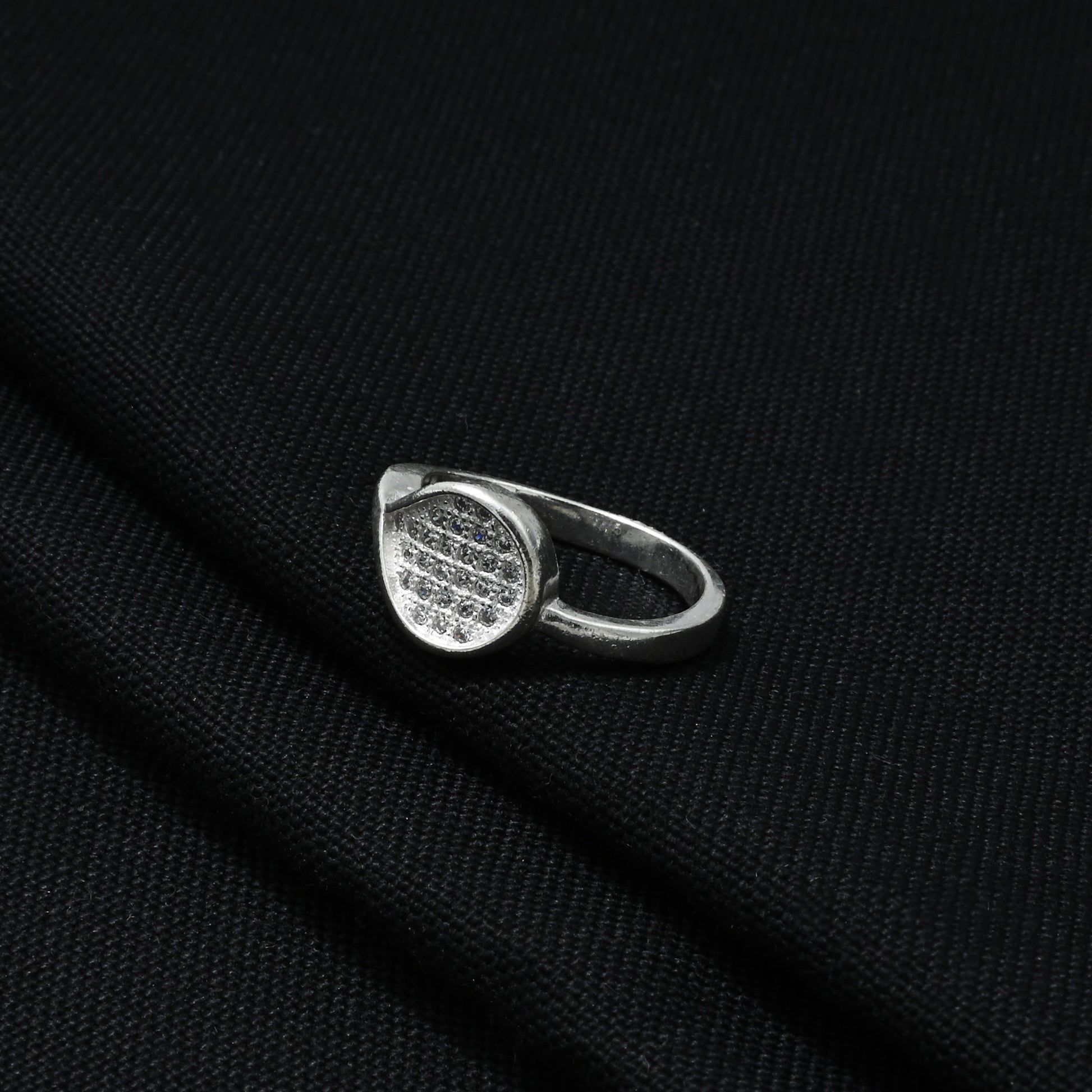 Silver Vanki ring featuring a sparkling curved design for a graceful and elegant look