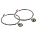 Silver girls' kada featuring a sunflower coiled design for a delicate and floral touch.