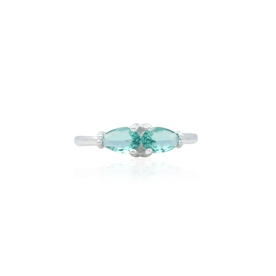 Silver ring featuring a slow-fading blue solitaire gemstone for a calming, elegant look