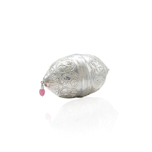 Exquisite silver auspicious marriage nariyal, symbolizing prosperity and good luck in weddings.