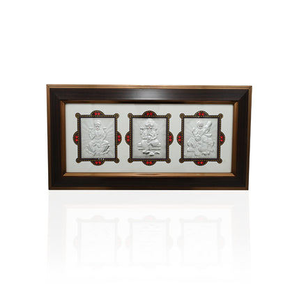 Silver Frame featuring Lord Ganesh, Goddess Laxmi, and Goddess Saraswati