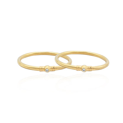 Silver kada with sharp gold accents for a sleek, modern look