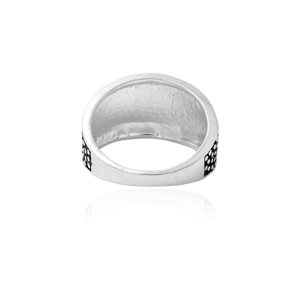 Sleek silver ring featuring a round black stone, perfect for both casual and formal wear.