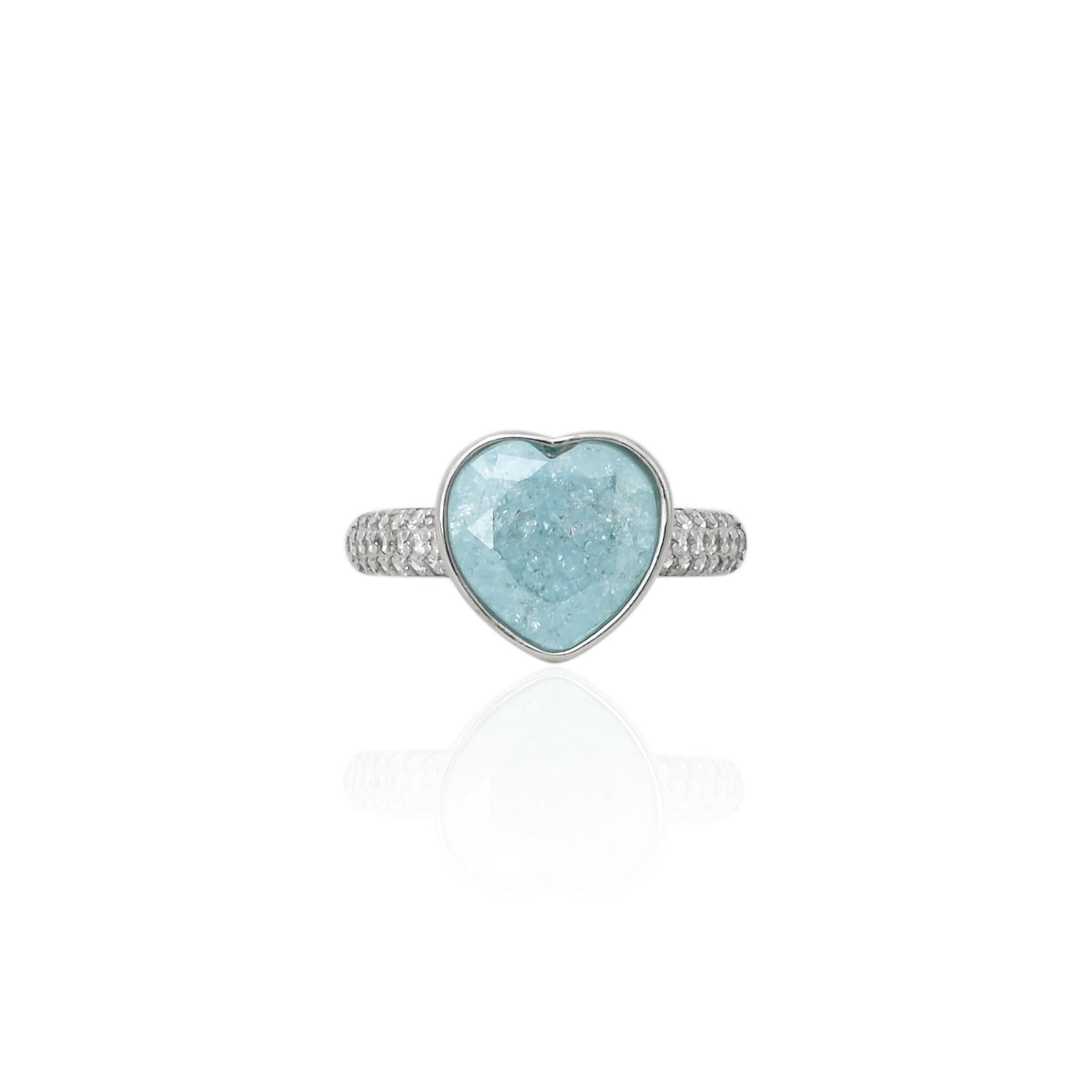 Silver ring for girls featuring a heart-shaped sky blue gemstone for a vibrant look