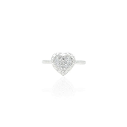 Silver ring with a heart-shaped design symbolizing passion.