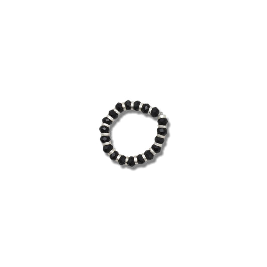 Silver ring featuring a chain design with black beads, offering a stylish and modern look