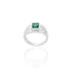 Close-up of a silver ring for boys with a stunning green gemstone, perfect for adding a pop of color and sophistication