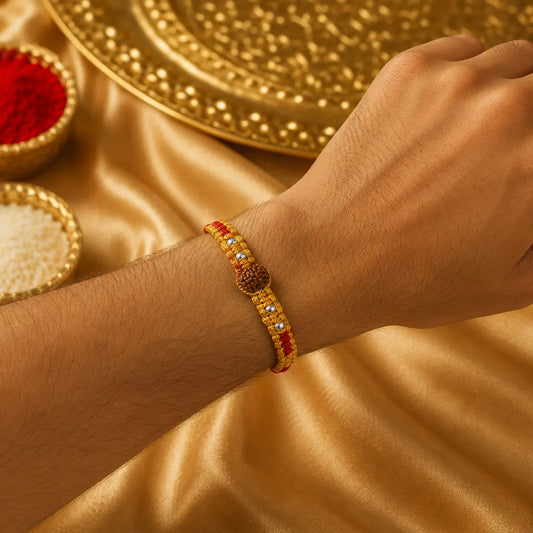 Traditional red Rudraksha Rakhi with natural Rudraksha beads and silver-tone beads
