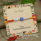 Silver Center Blue Flower with Silver and Light Blue Beads Rakhi for Boys