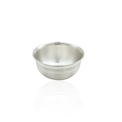 Luxurious shiny silver utensil bowl with a polished finish