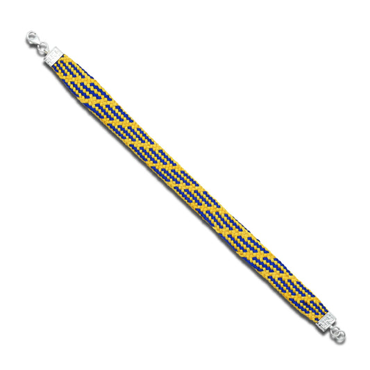 Elegant silver moli bracelet featuring a stylish blue and yellow knitted thread design