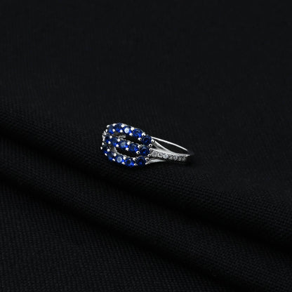 Delicate 925 silver ring with calming blue gemstones for a graceful touch.
