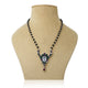 Elegant silver mangalsutra for girls featuring a drop design with green and purple gemstones