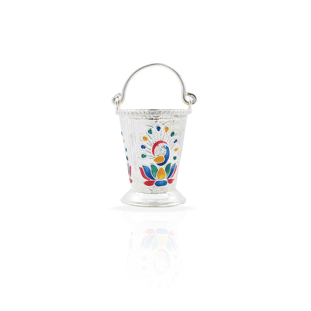 Exquisite silver bucket featuring a detailed peacock design